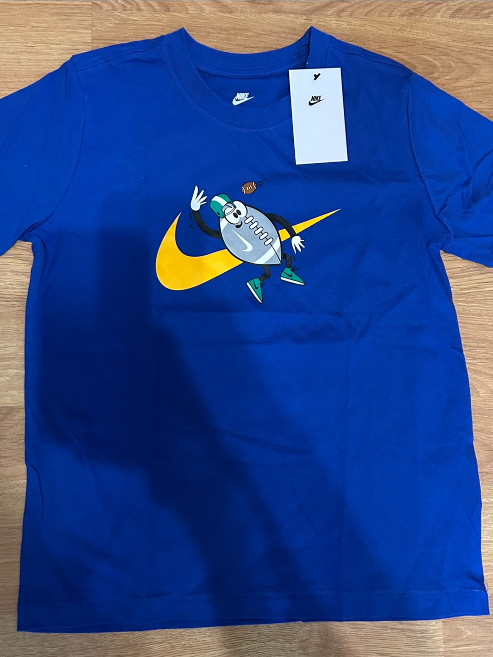 Nike Royal Blue Graphic Tee with Yellow Swoosh